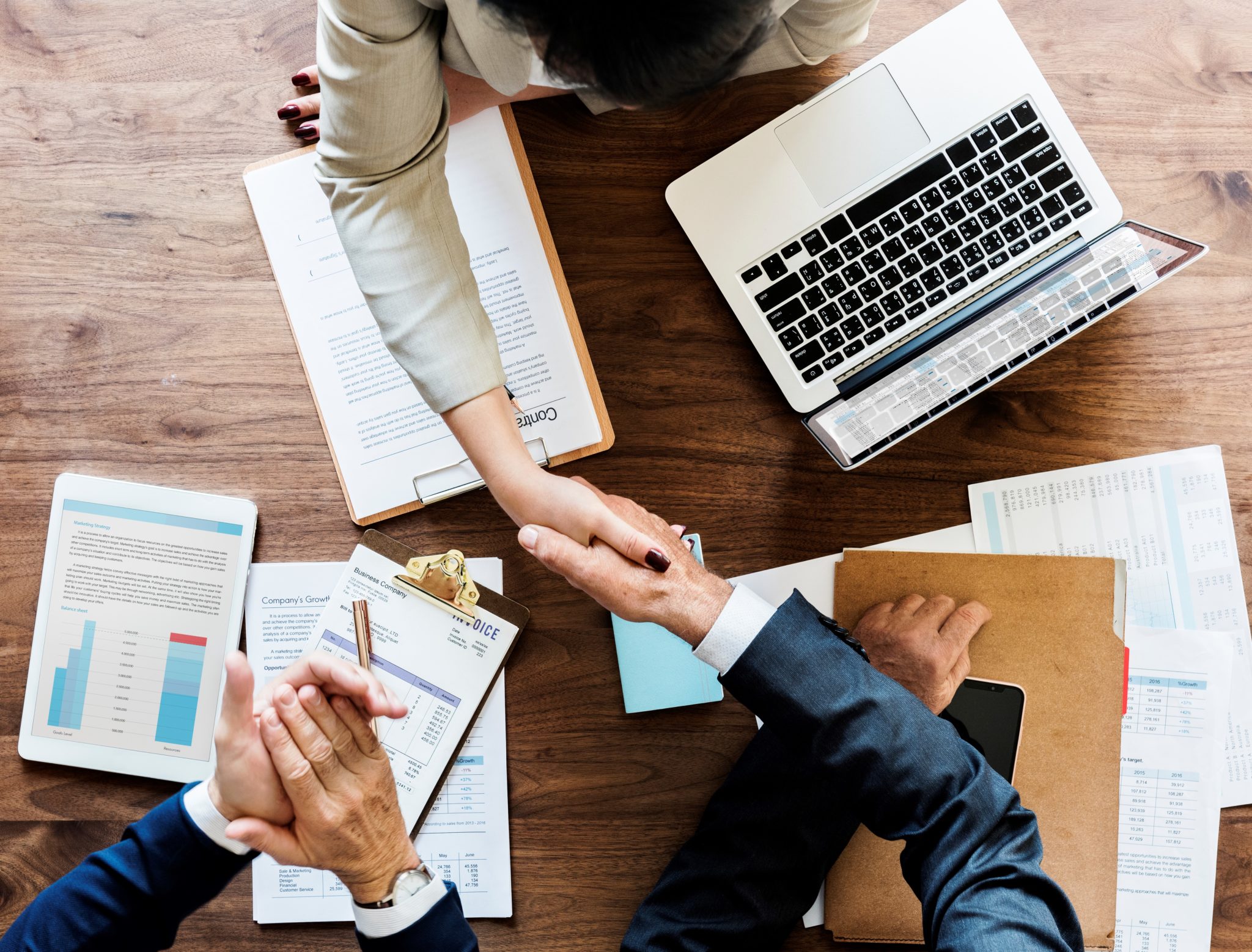 Business People Shaking Hands Together